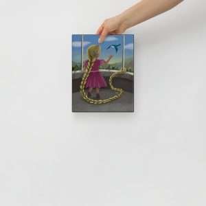 Hand holding an 8x10 inch canvas print of Rapunzel with a cochlear implant illustration, detailed and colorful art piece
